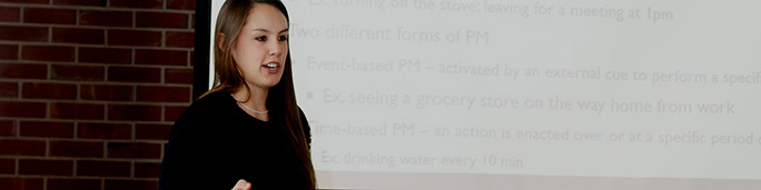 A female student at a presentation