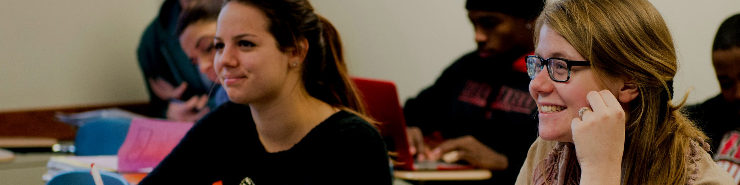 Students in a classroom posing