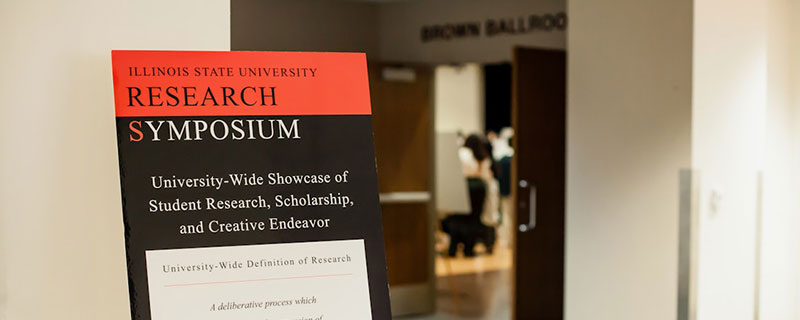 Research symposium sign.