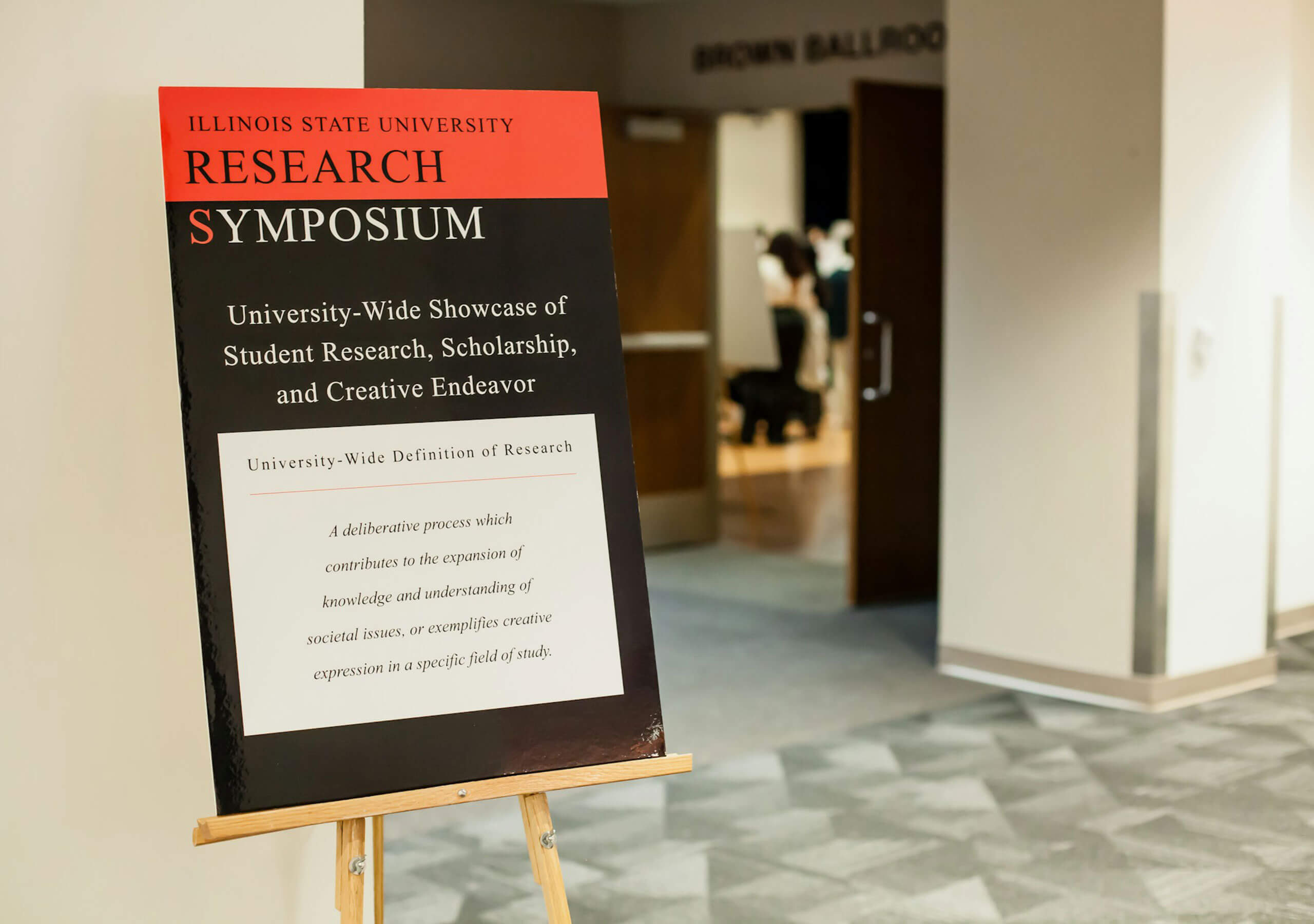 Poster board showing what the Symposium is.